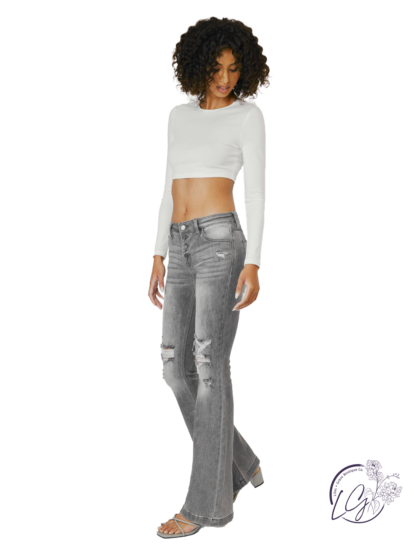 Nola Mid-Rise Button Fly Distressed Flare Jean by KanCan