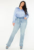 Talia Curvy Mid Rise Y2k Medium Wash Bootcut Jeans
